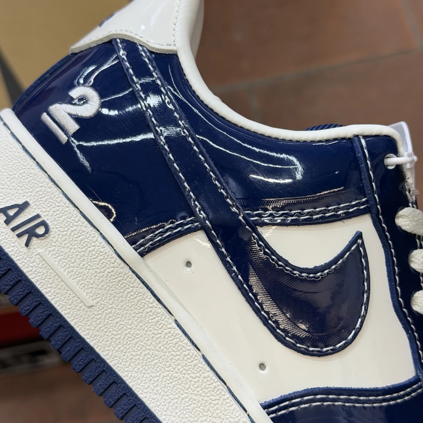 Nike Air Force 1 Low Sneakers – White & Navy Blue Patent
