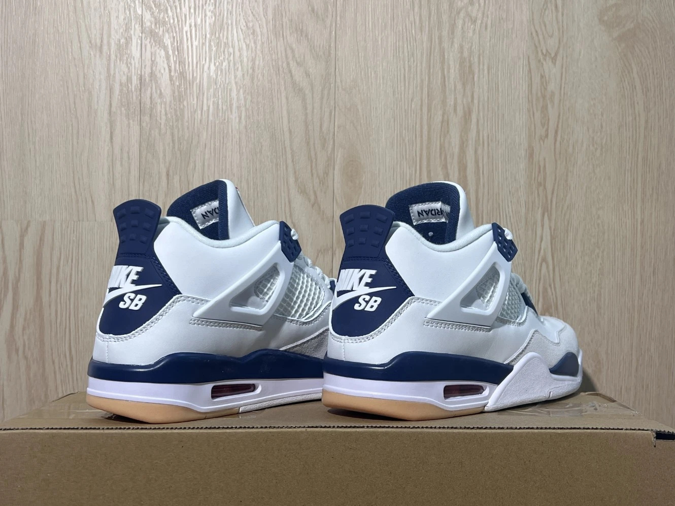 Nike Air Jordan 4 Retro White, Navy Blue & Gum Sole Sneakers – Premium Streetwear Edition