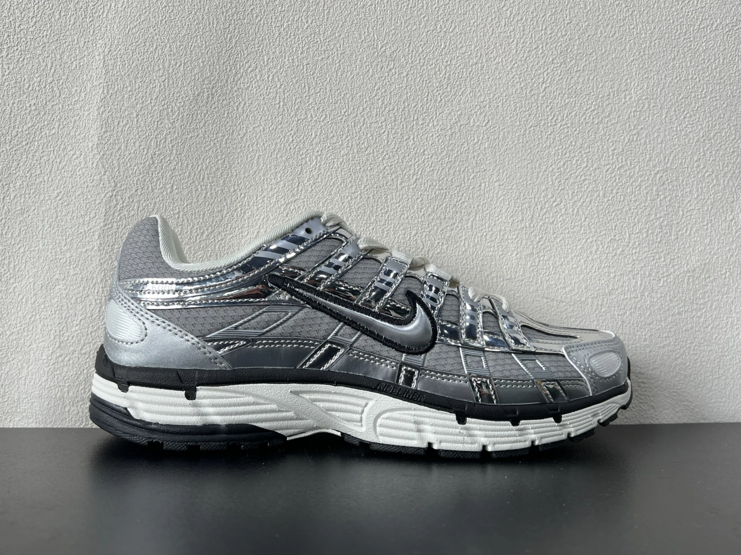 Nike P-6000 Metallic Silver Running Sneakers – Retro Futuristic Lifestyle Shoes