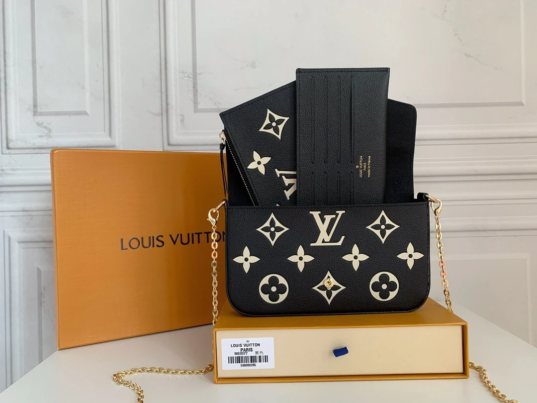 Louis Vuitton Félicie Pochette in Black and Cream Monogram Empreinte Giant Leather