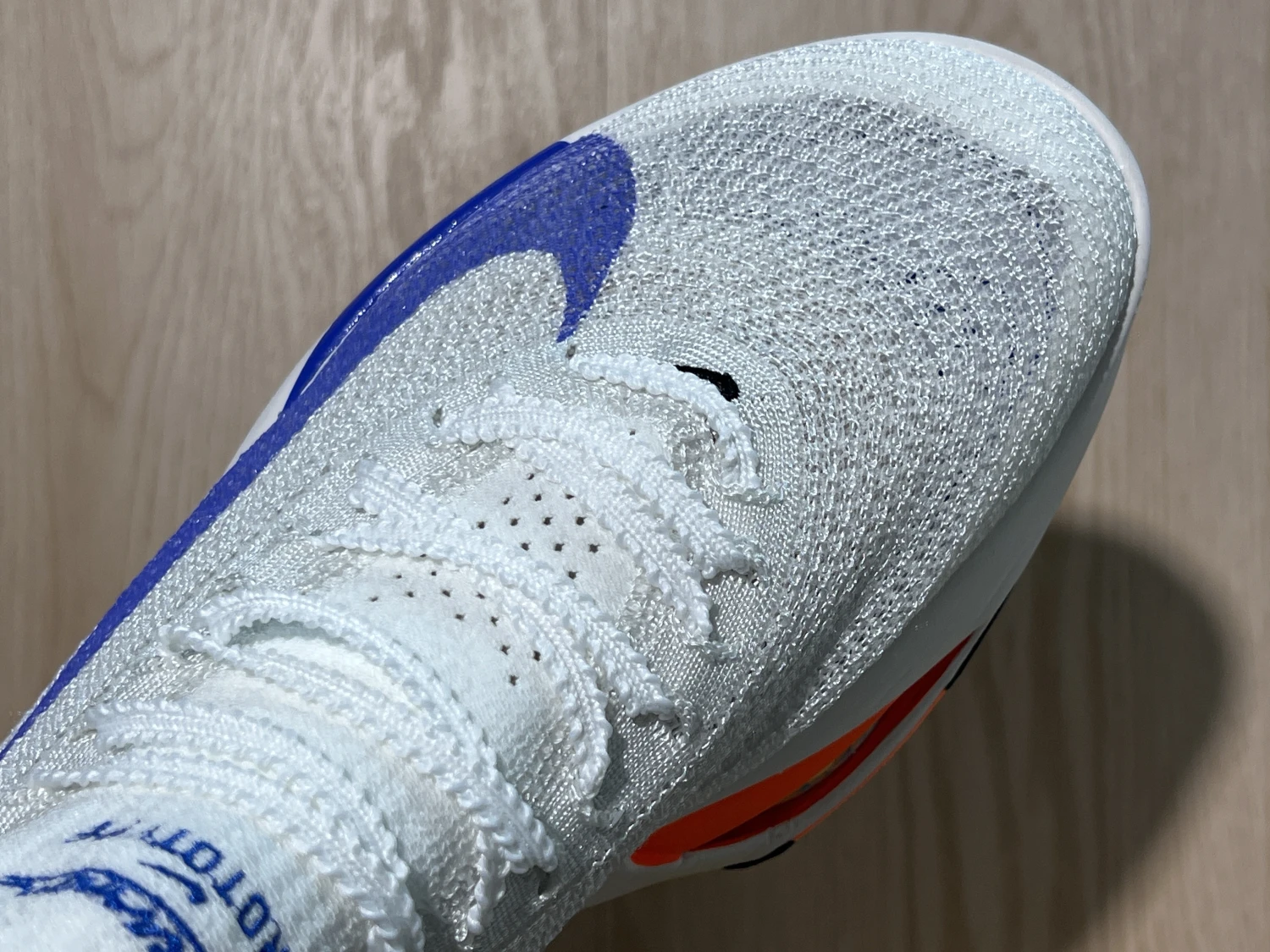 Nike ZoomX Elite Running Sneakers – White Orange Blue