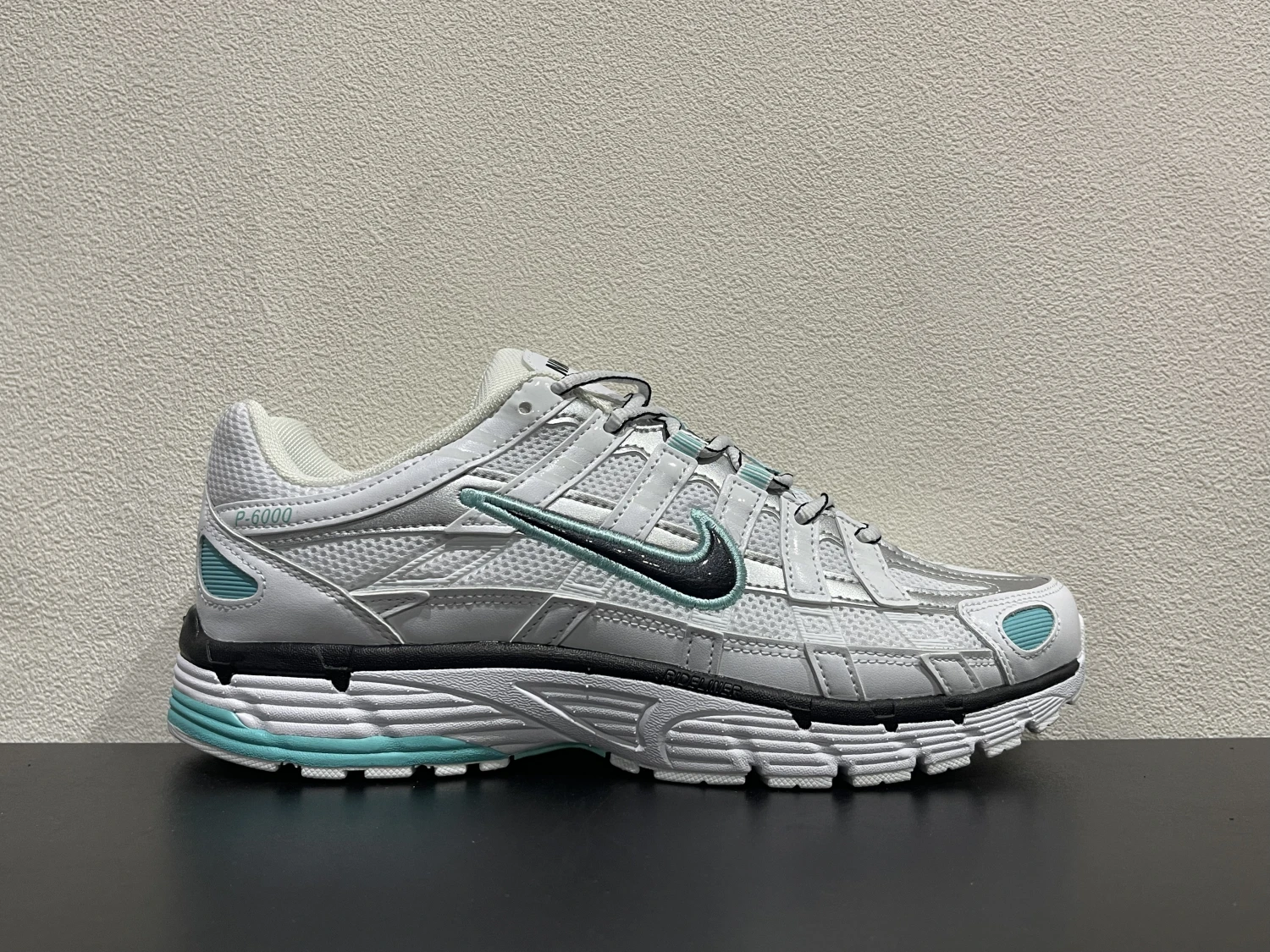 Nike Bomberman Series Sneakers – White, Silver & Aqua Blue
