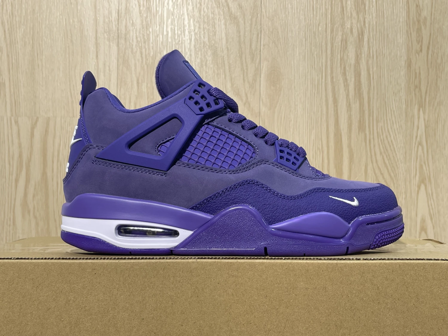 Air Jordan 4 Retro Purple Monochrome Sneaker – Limited Edition Style