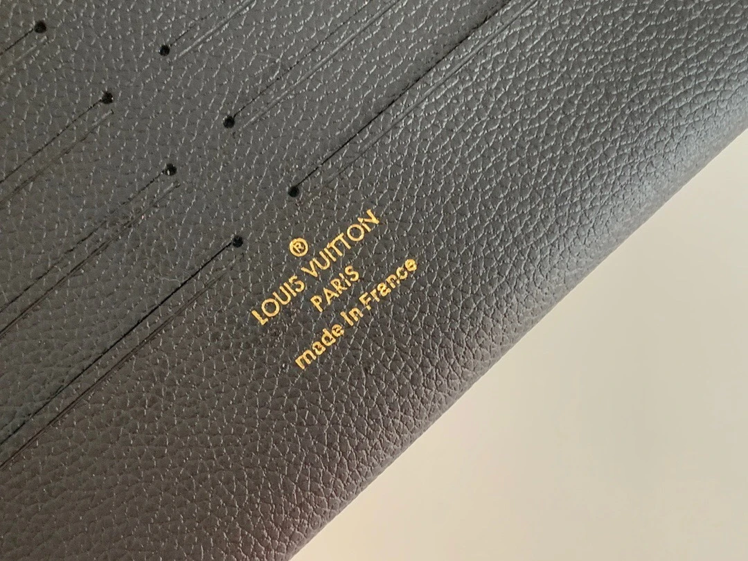 Louis Vuitton Félicie Pochette in Black and Cream Monogram Empreinte Giant Leather
