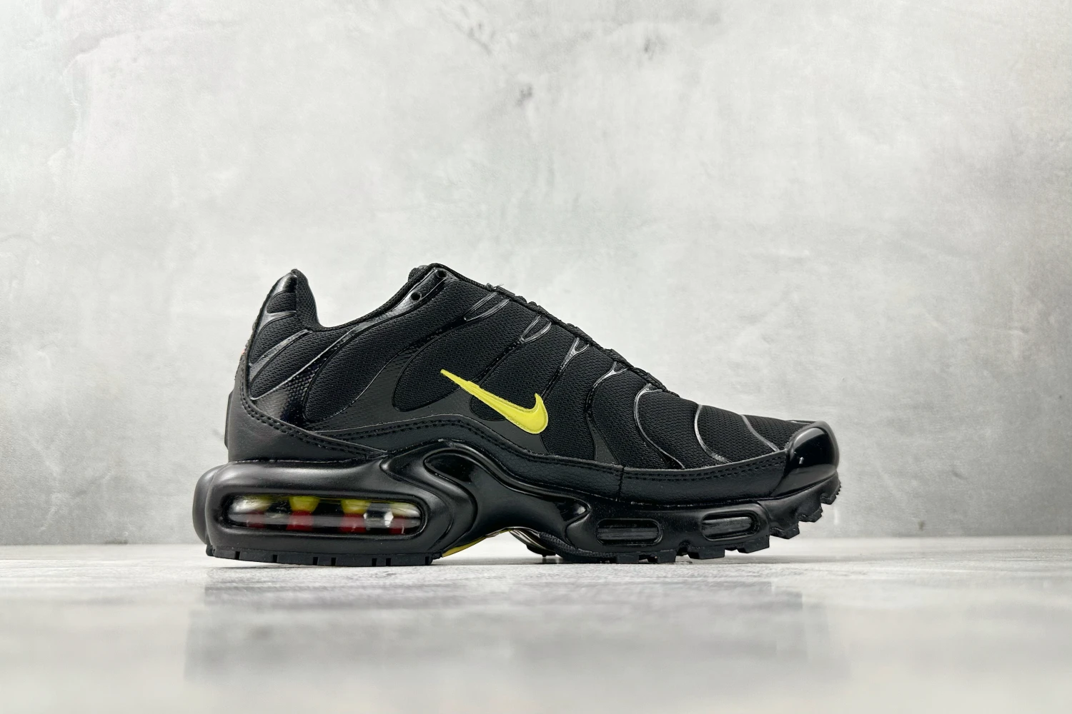 Nike Air Max Plus TN Triple Black Volt Sneakers