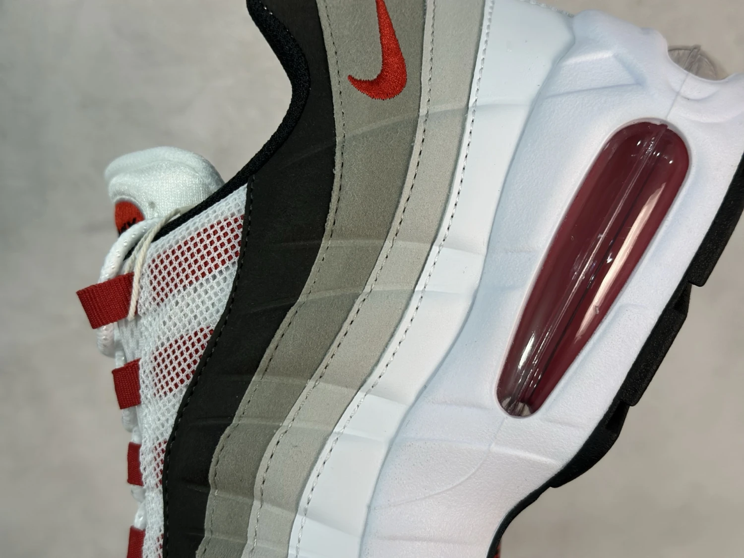 Nike Air Max 95 Sneakers – White / Black / University Red