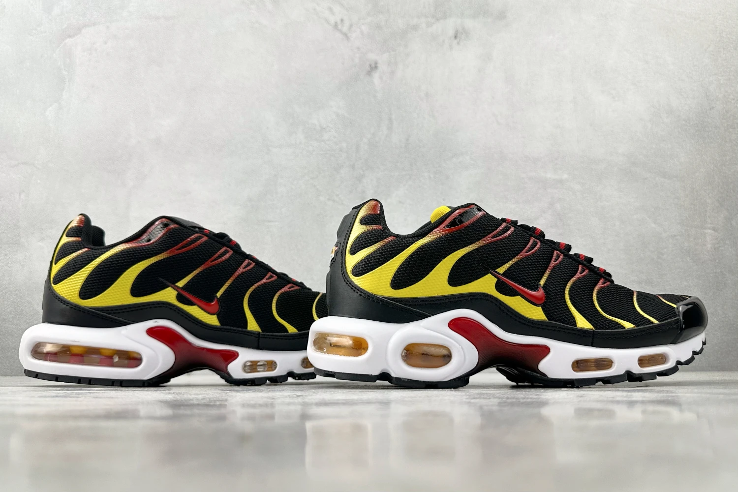 Nike Air Max Plus TN Black Yellow Red Gradient Sneakers
