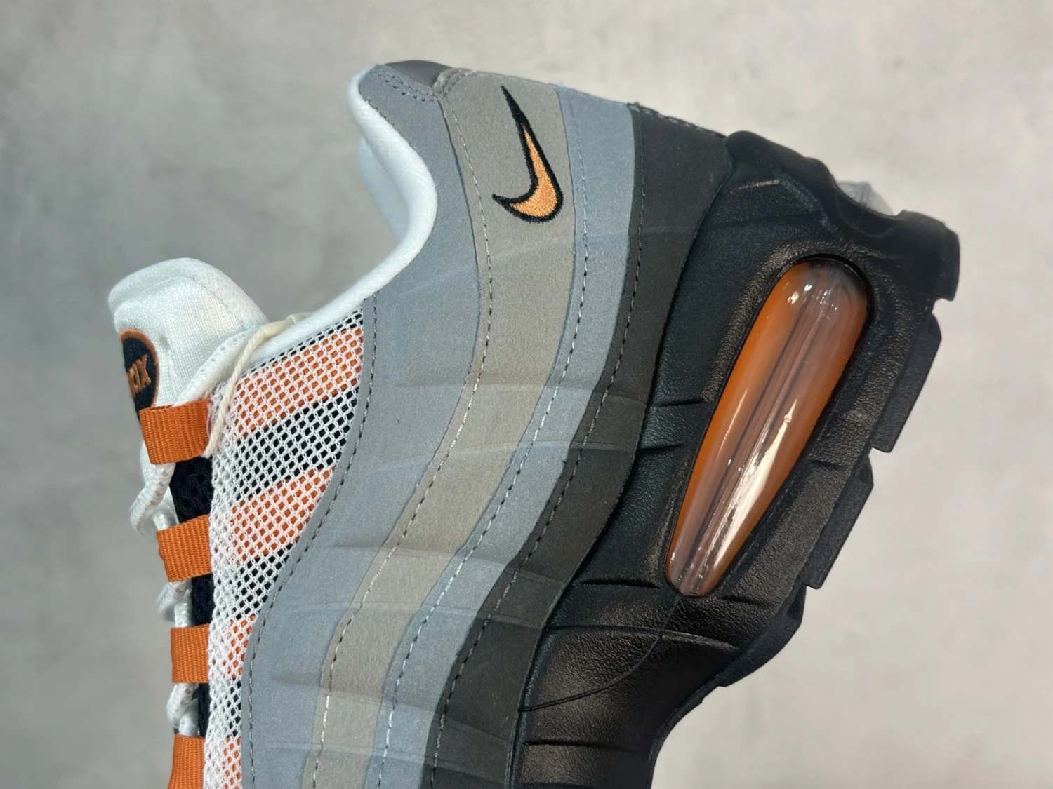 Nike Air Max 95 Sneakers – White, Grey, Black & Orange