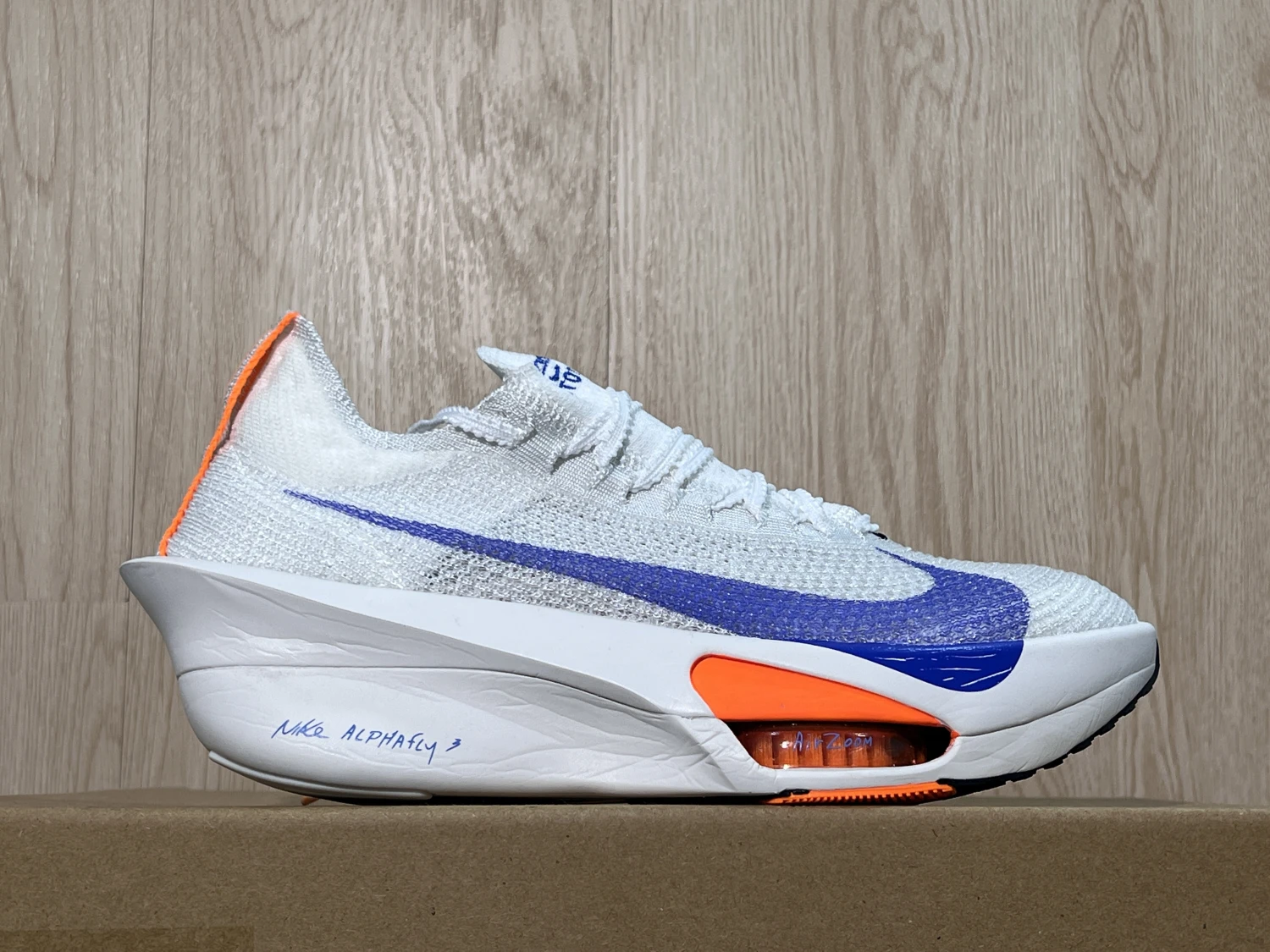 Nike ZoomX Elite Running Sneakers – White Orange Blue