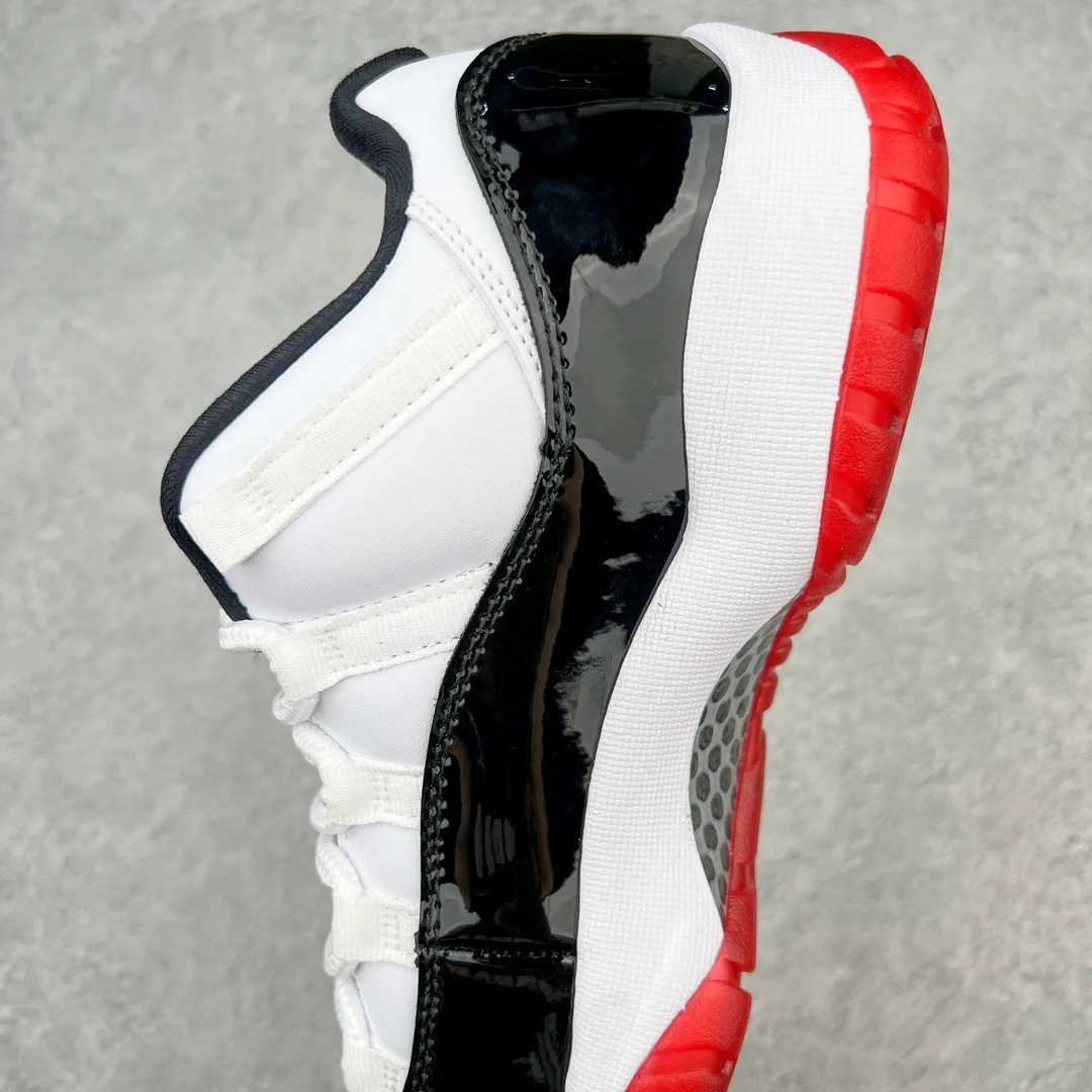 Air Jordan 11 Low "White, Black & Red" Premium Sneakers