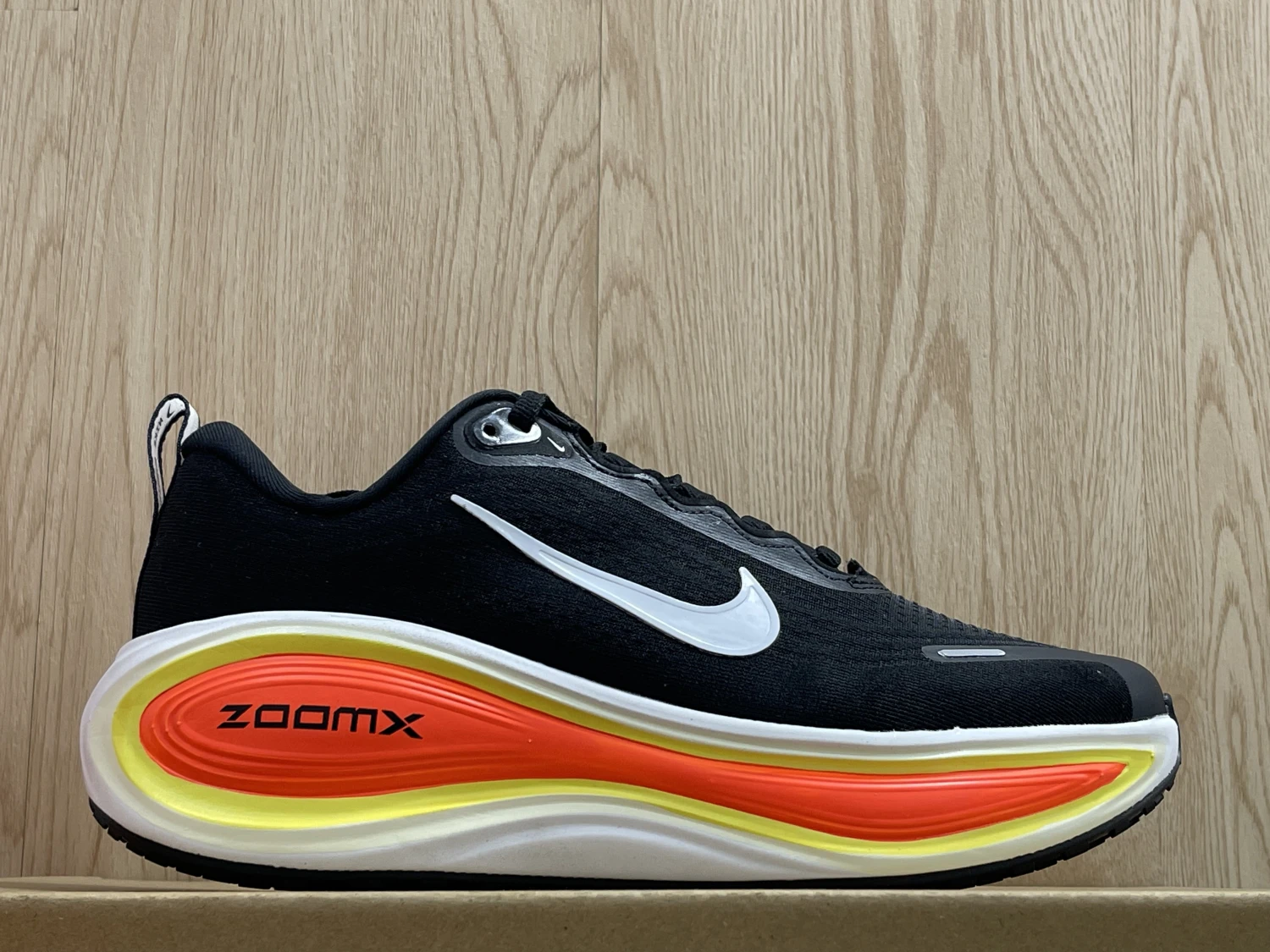 Nike Run Vomero Plus – Black / White / Safety Orange