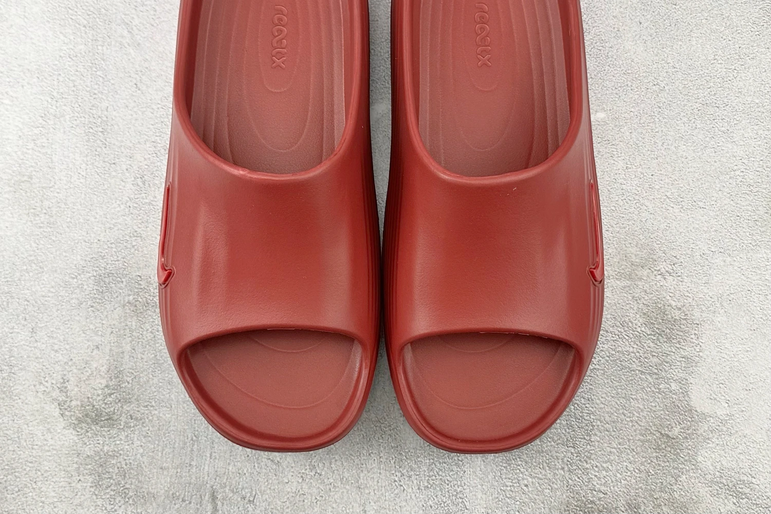 Nike ReactX Slide – Rust Red