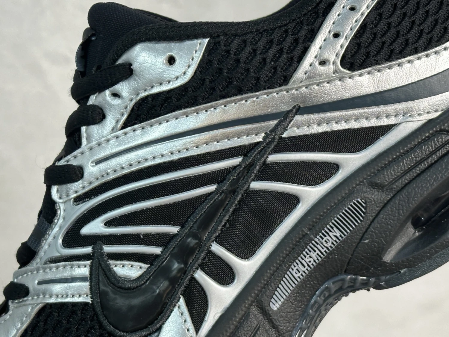 Nike Air Max Moto 2K – Black & Metallic Silver