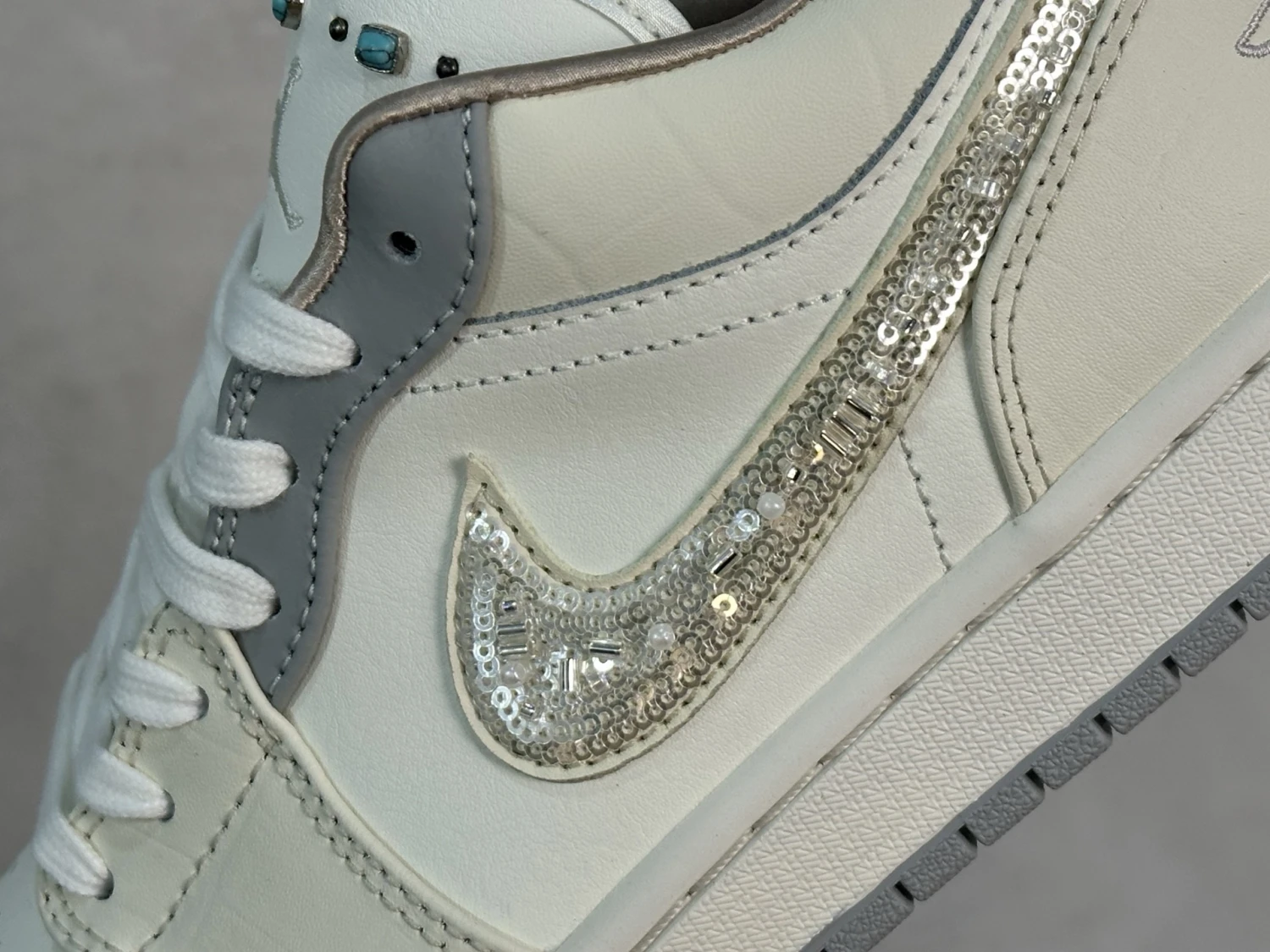 Air Jordan Low – White, Silver & Turquoise Accent Sneakers