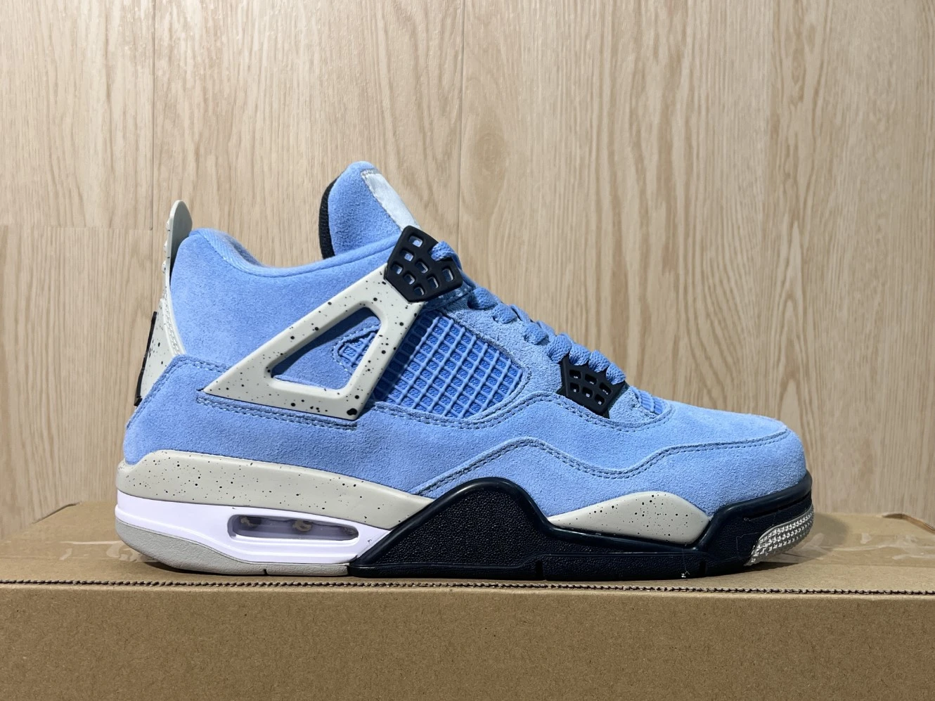 Nike Air Jordan 4 Retro “University Blue Suede” Sneakers