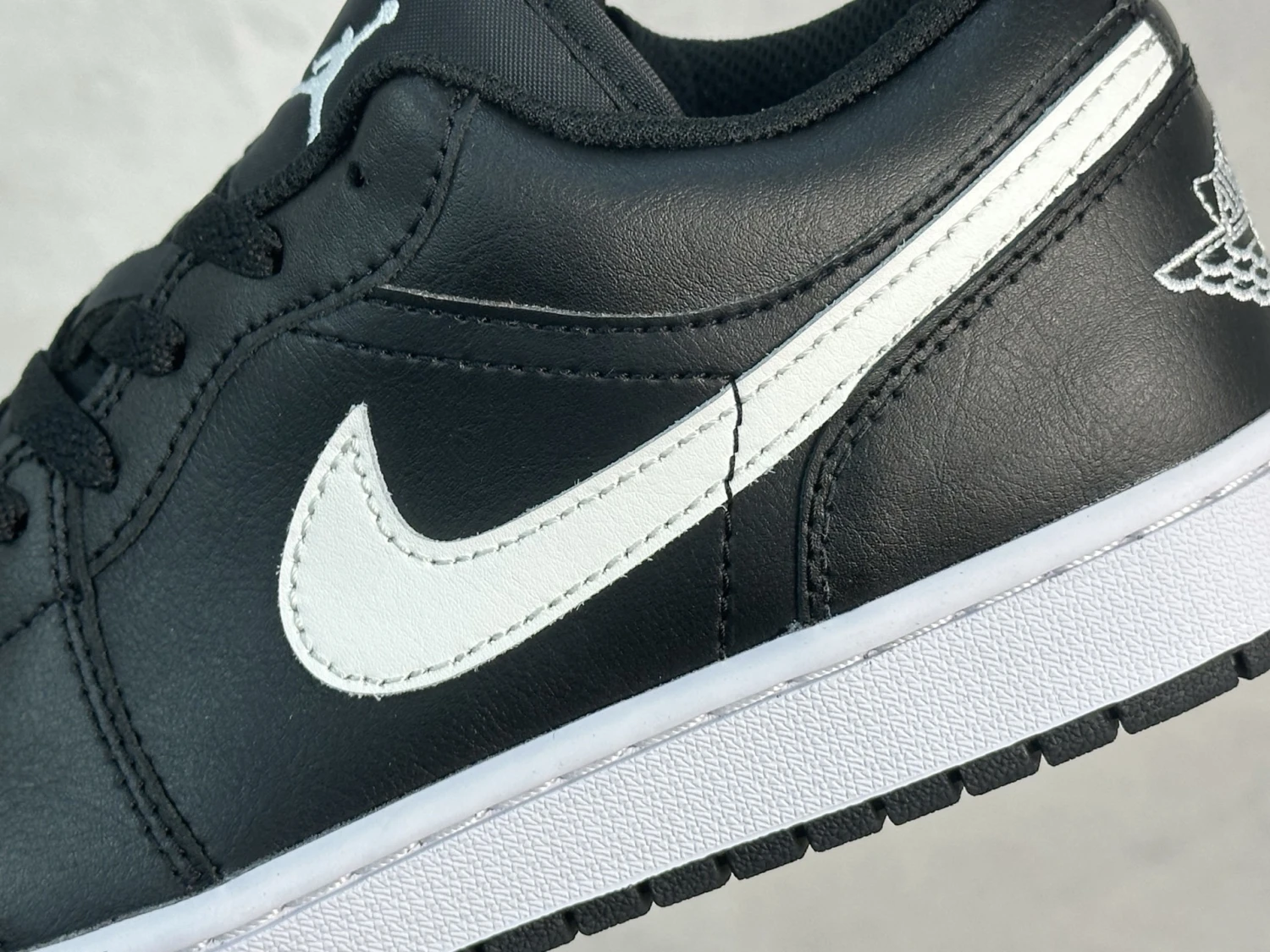 Air Jordan 1 Low – Black & White Retro Sneakers