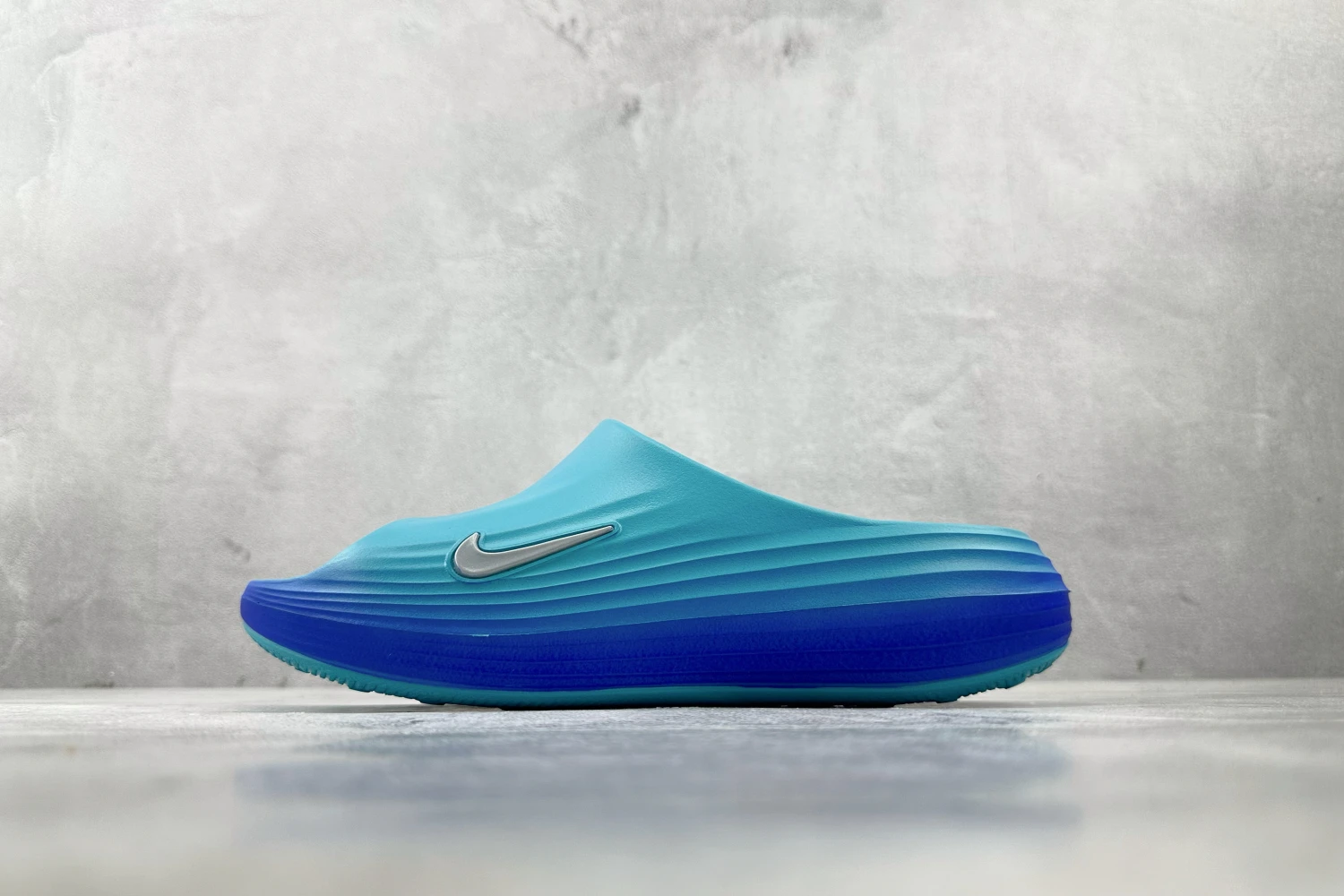 Nike ReactX Slide – Sky Blue