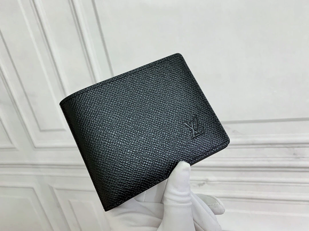 Louis Vuitton Slender Wallet in Black Taiga Leather