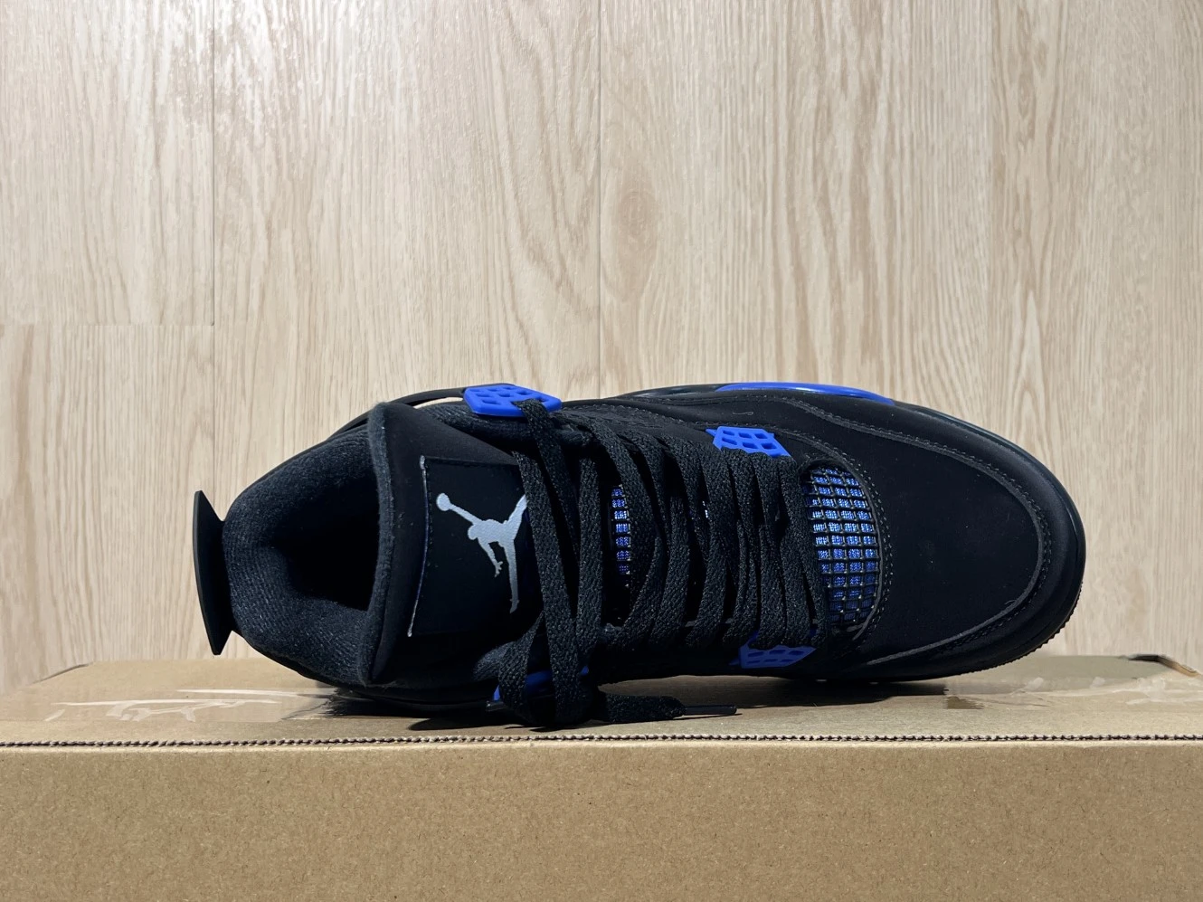 Nike Air Jordan 4 Retro Black & Royal Blue Sneakers