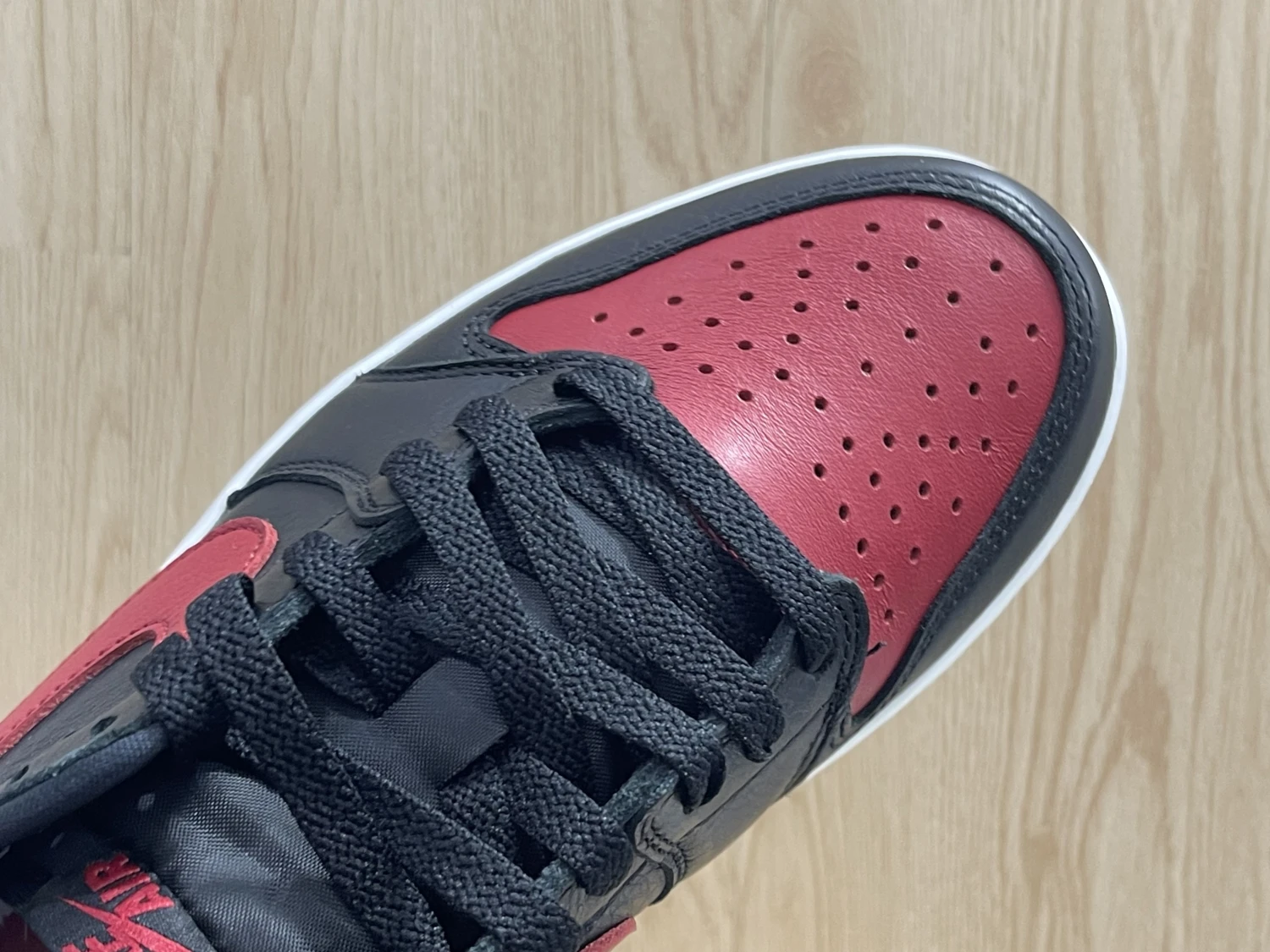 Nike Air Jordan 1 Low Retro Bred Red & Black Sneaker