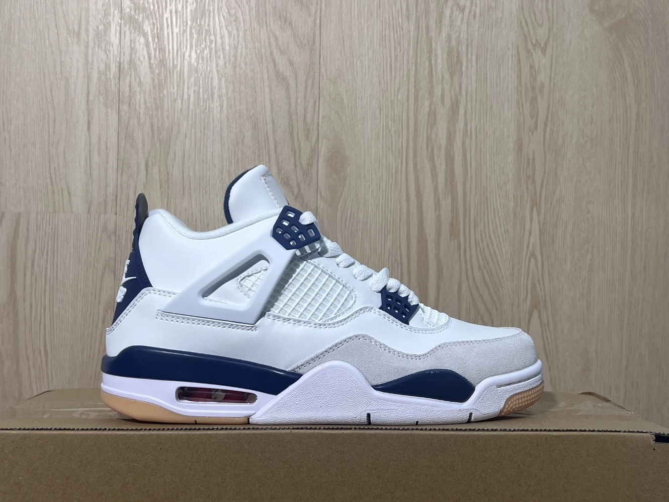 Nike Air Jordan 4 Retro White, Navy Blue & Gum Sole Sneakers – Premium Streetwear Edition