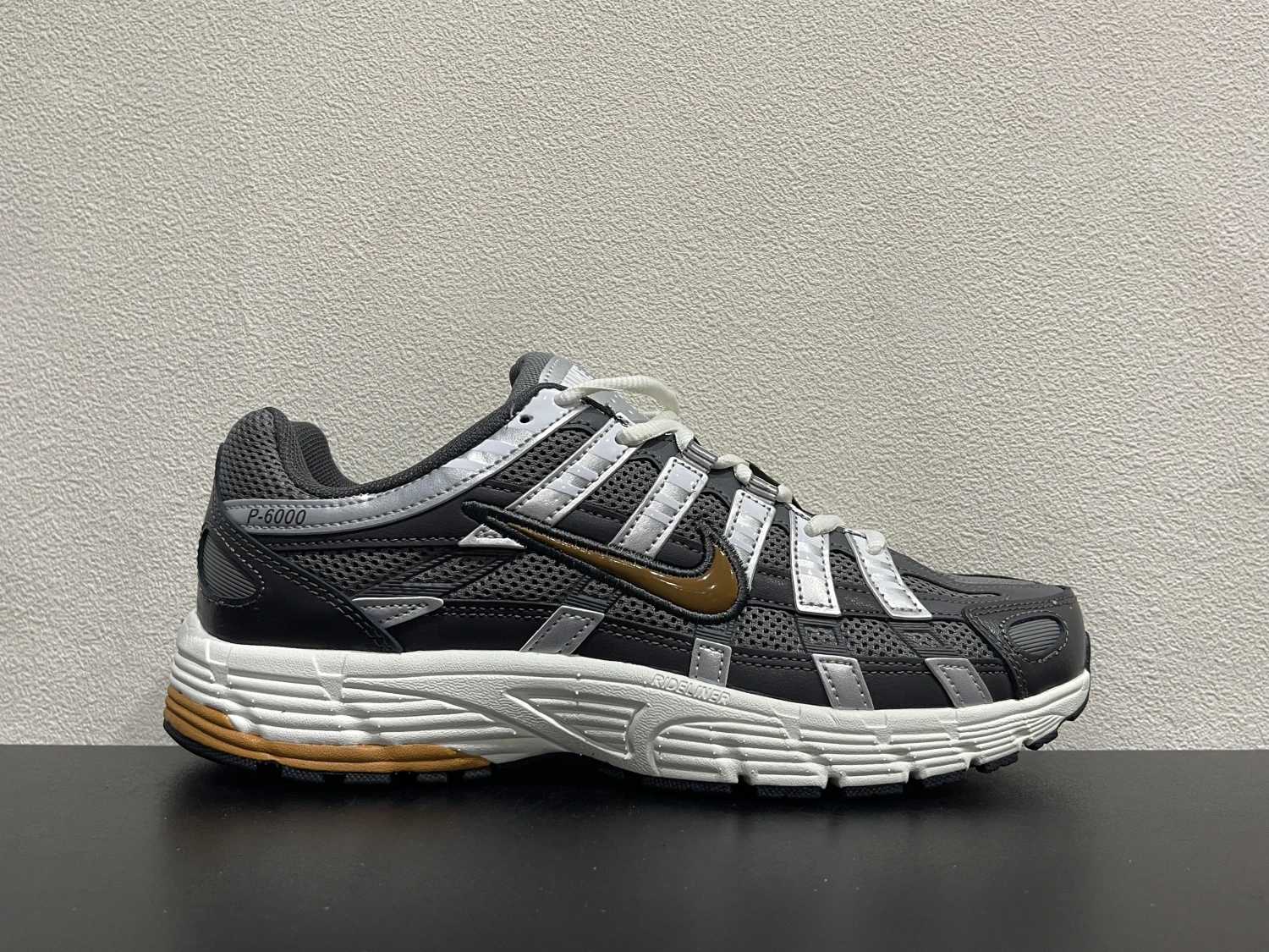 Nike Bomberman Series Sneakers – Charcoal Grey, Cool Grey & Metallic Gold