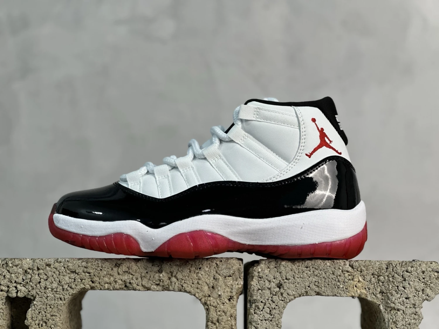 Air Jordan 11 Retro "White, Black & Varsity Red" Basketball Sneakers