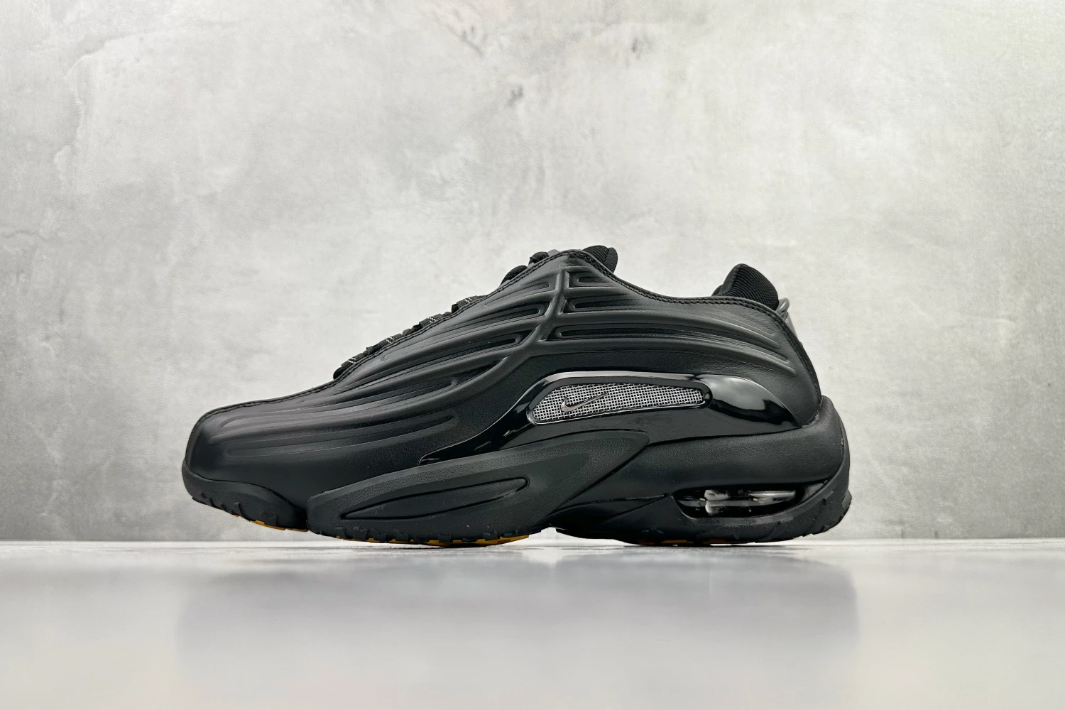 Nike NOCTA Glide – Triple Black
