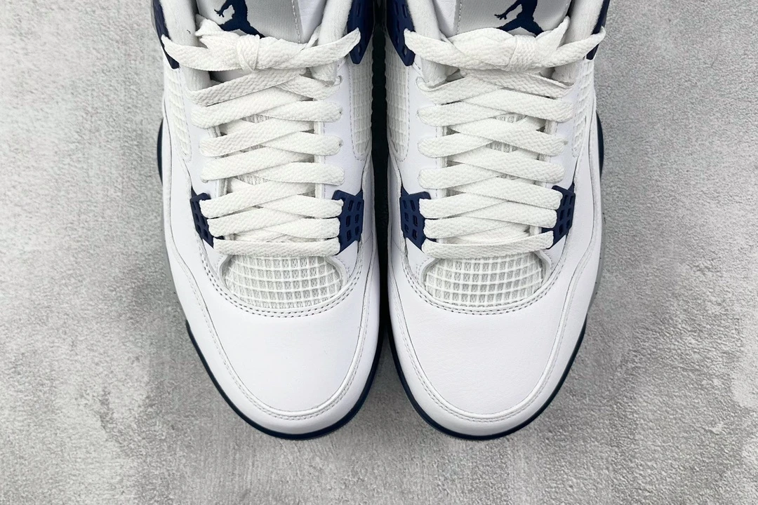 Air Jordan 4 Retro – White & Royal Blue Sneakers