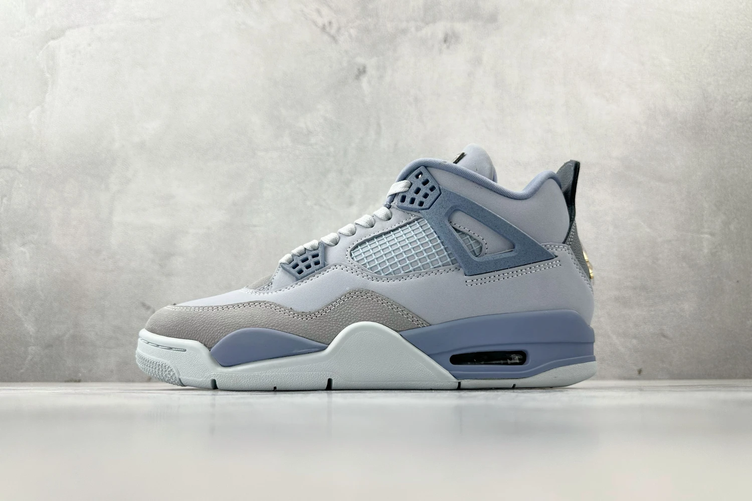Air Jordan 4 Retro Sneakers – Ice Blue Edition