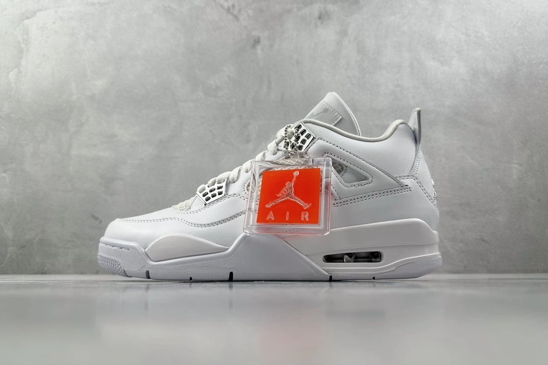 Air Jordan 4 Retro – Triple White Sneakers