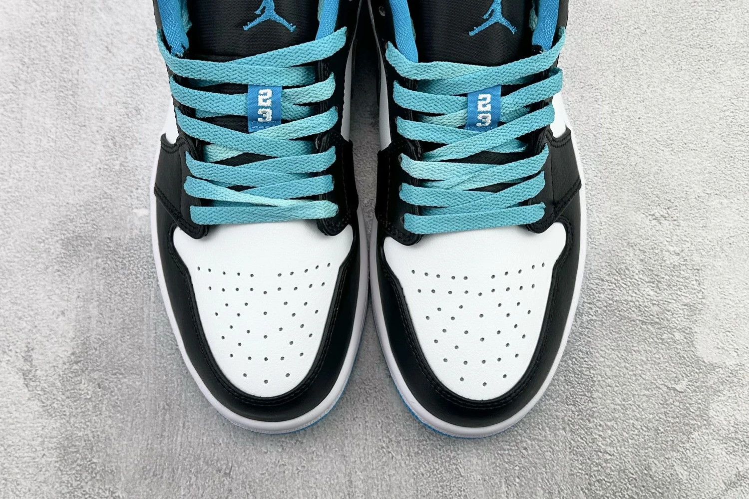 Jordan Low Black, White & Ice Blue Sneaker