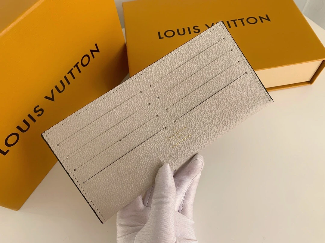 Louis Vuitton Félicie Pochette in Tourterelle/Crème Monogram Empreinte Leather