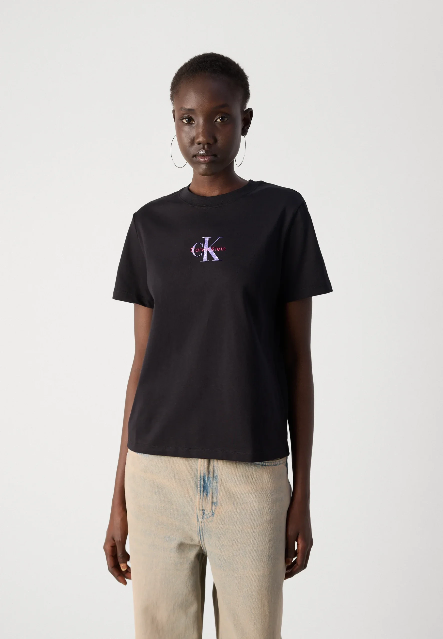 Calvin Klein Jeans WomCalvin Klein Jeans Women’s Black Printed Short Sleeve T-Shirten’s Black Printed Short Sleeve T-Shirt