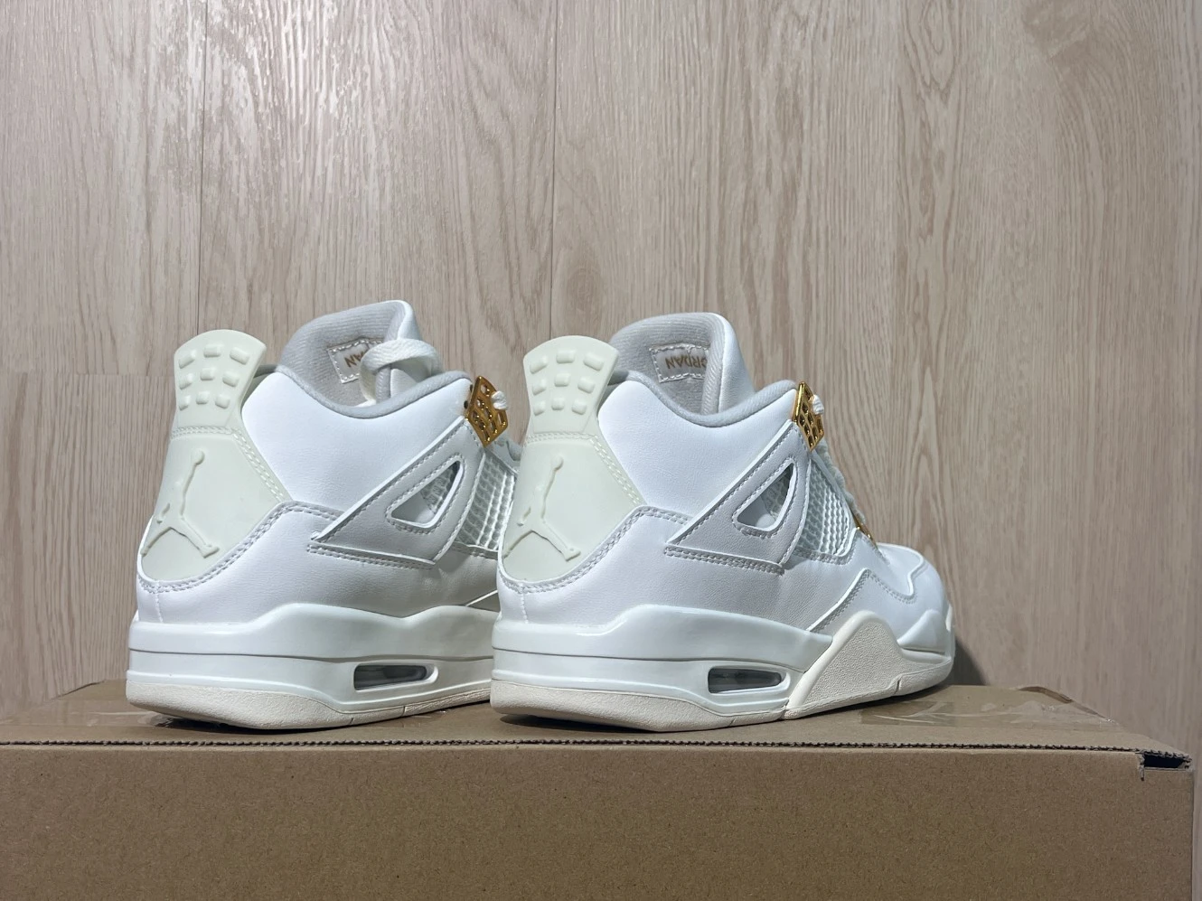 Nike Air Jordan 4 Retro Triple White & Metallic Gold Sneakers