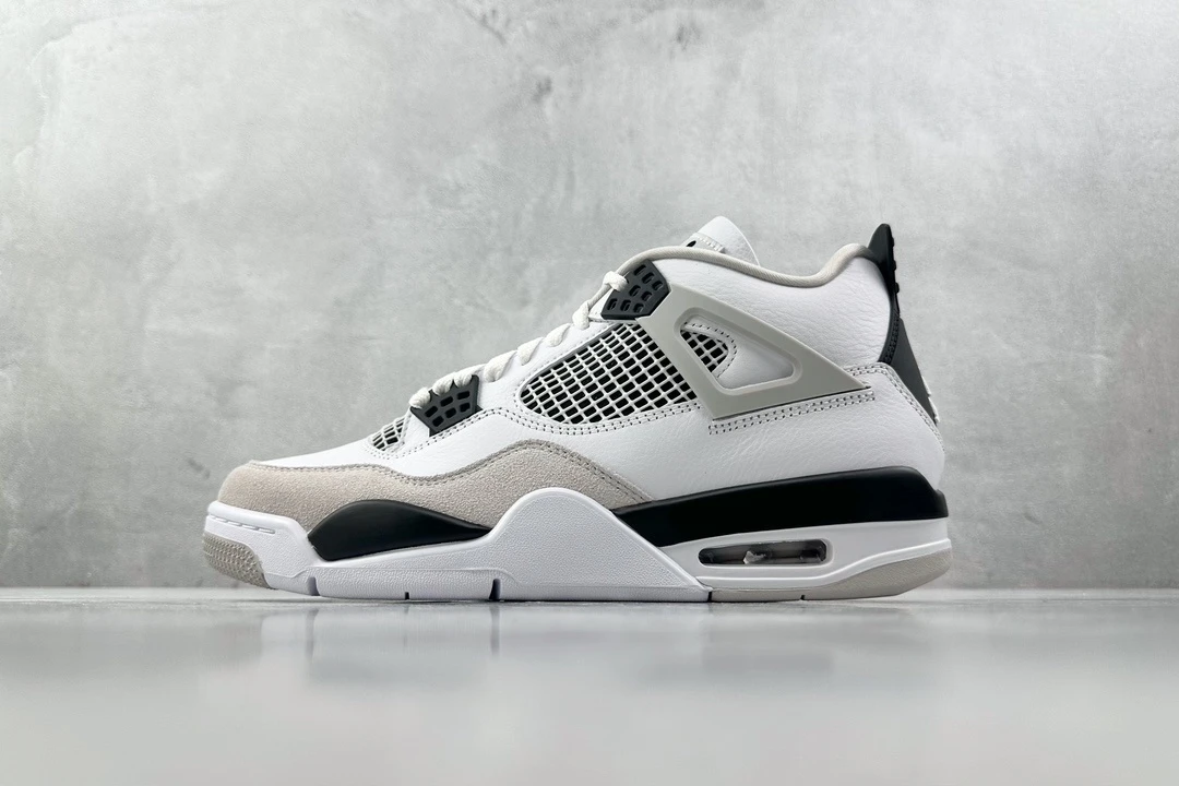 Air Jordan 4 Retro – White & Black Sneakers