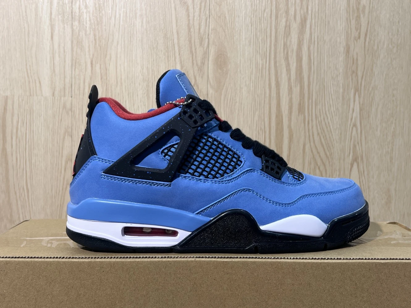 Nike Air Jordan 4 Retro “University Blue” Sneakers