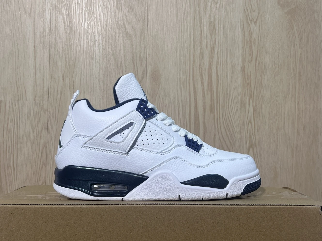 Nike Air Jordan 4 Retro White & Navy Blue Sneakers