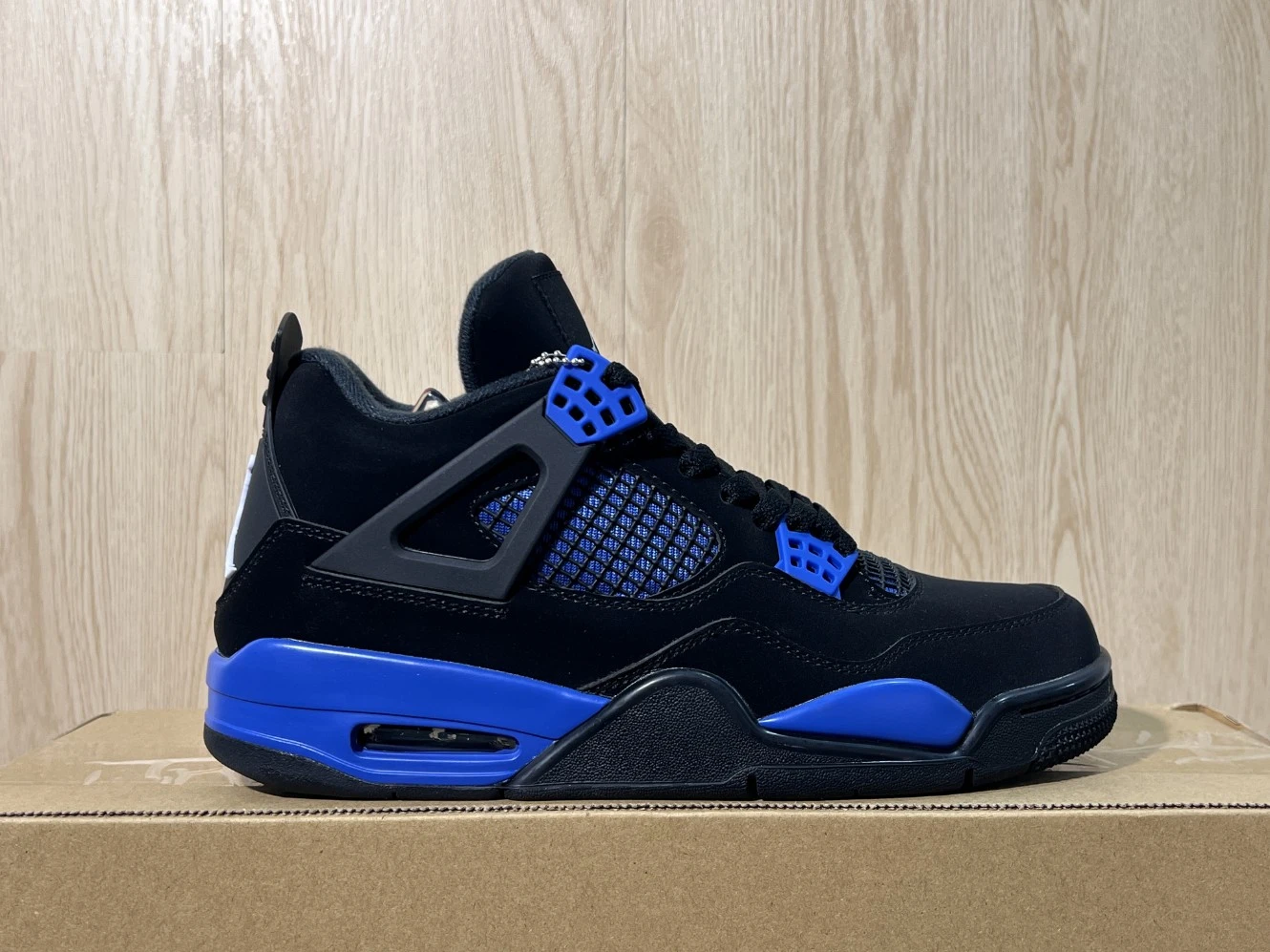 Nike Air Jordan 4 Retro Black & Royal Blue Sneakers