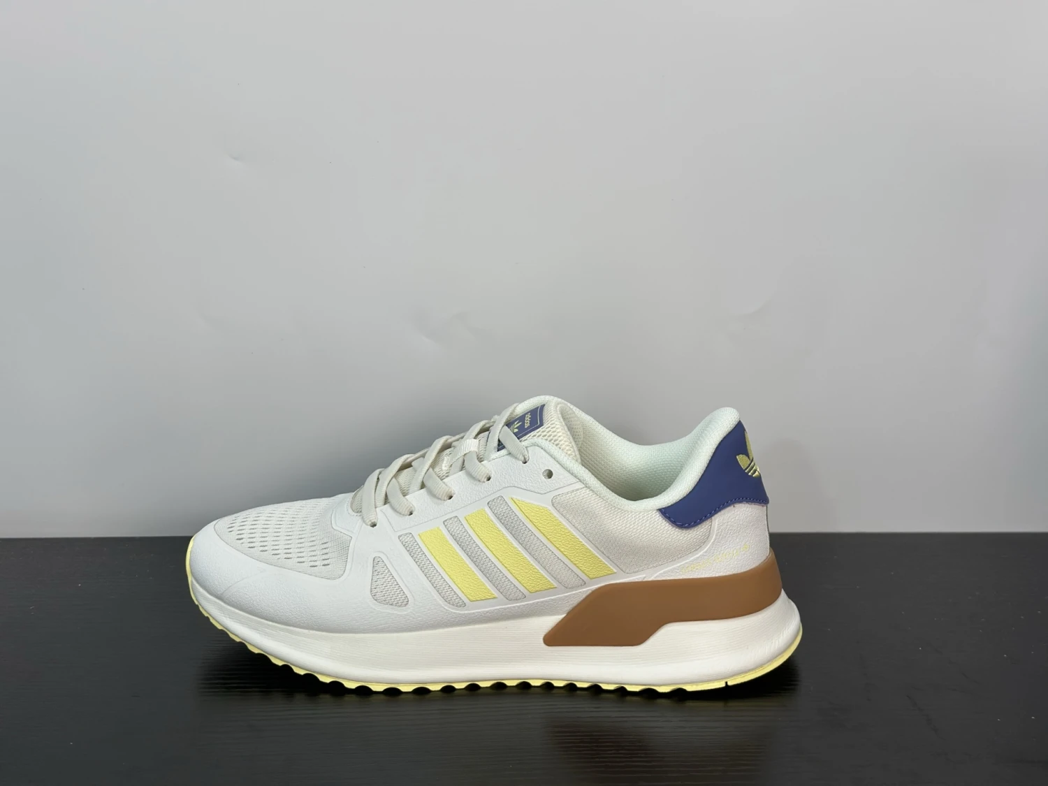 Adidas Duramo Running Shoes – Cloud White / Semi Flash Yellow / Collegiate Purple