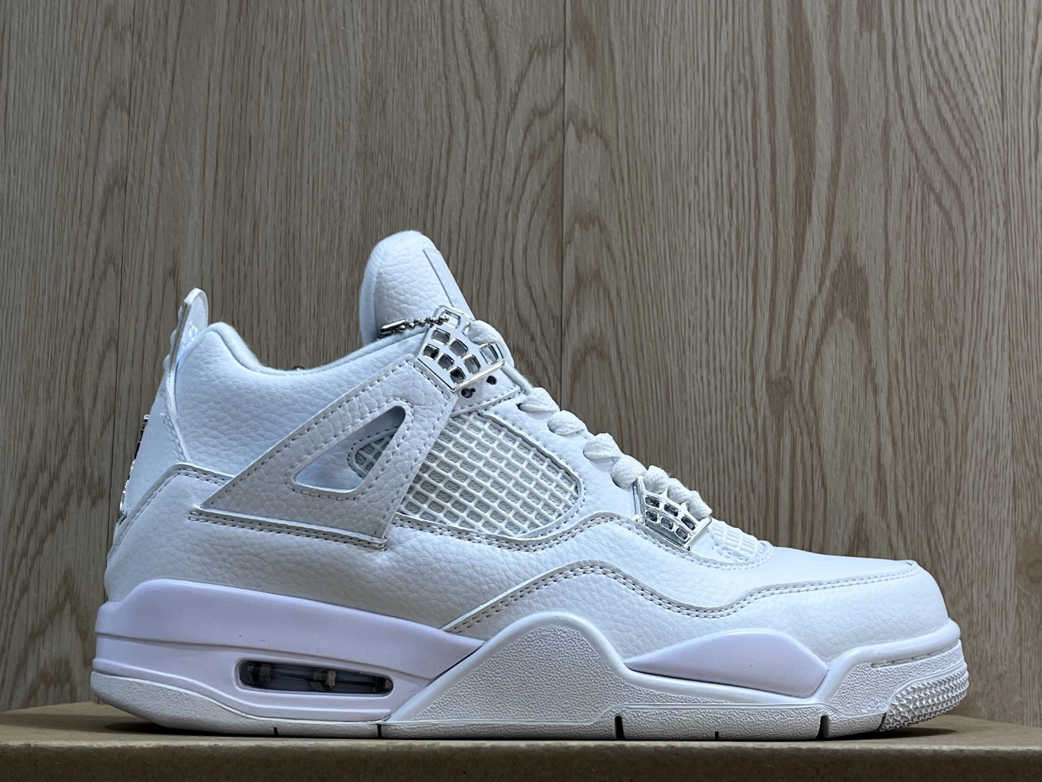 Air Jordan 4 Retro Triple White Premium Sneaker