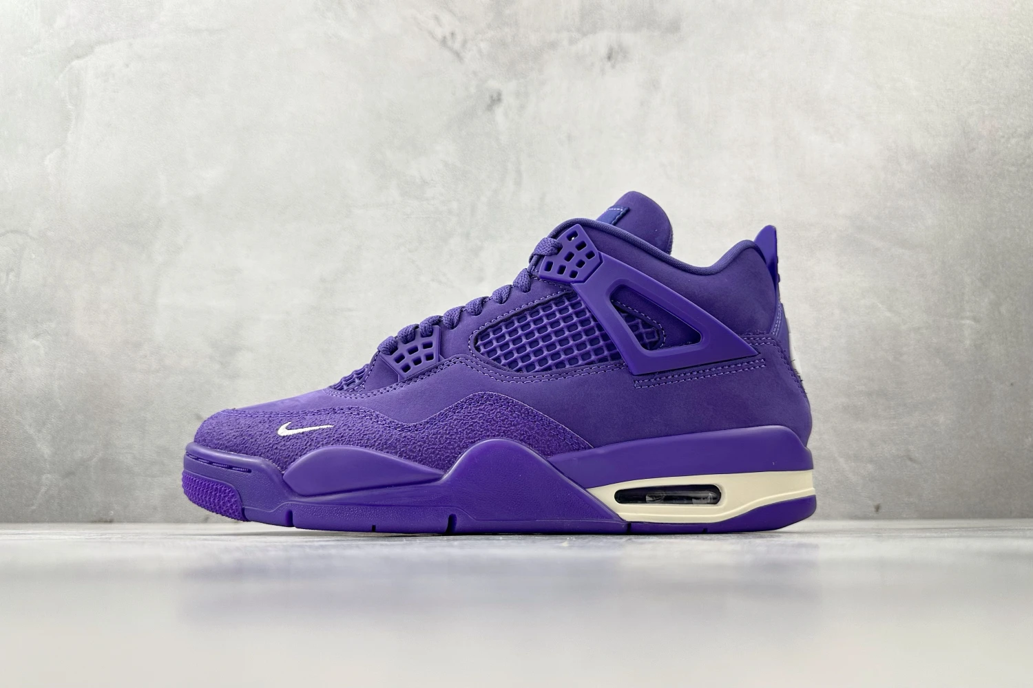 Air Jordan 4 Retro Sneakers – Deep Purple Monochrome Edition