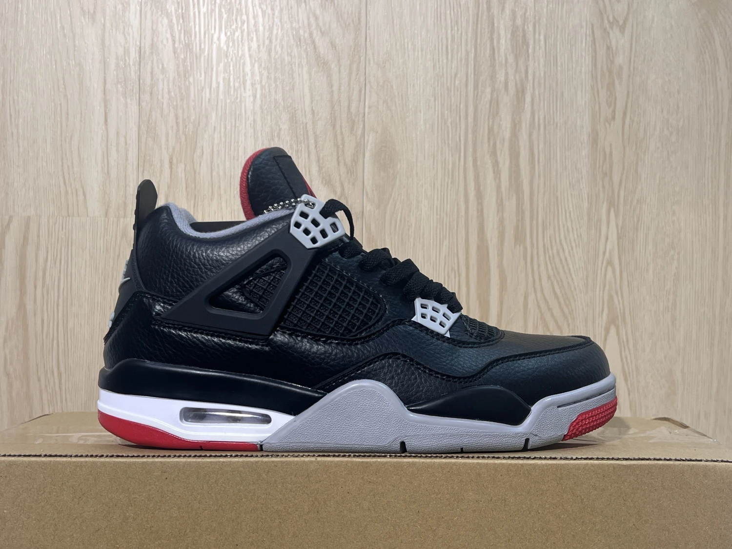 Air Jordan 4 Retro Bred Sneaker – Classic Black Red Edition