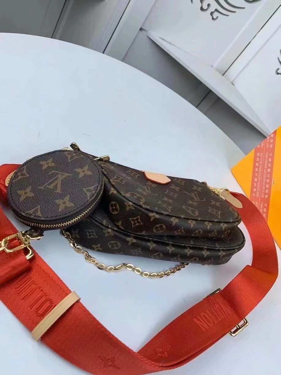 Louis Vuitton Multi Pochette Accessoires in Classic Monogram Canvas with Red Strap