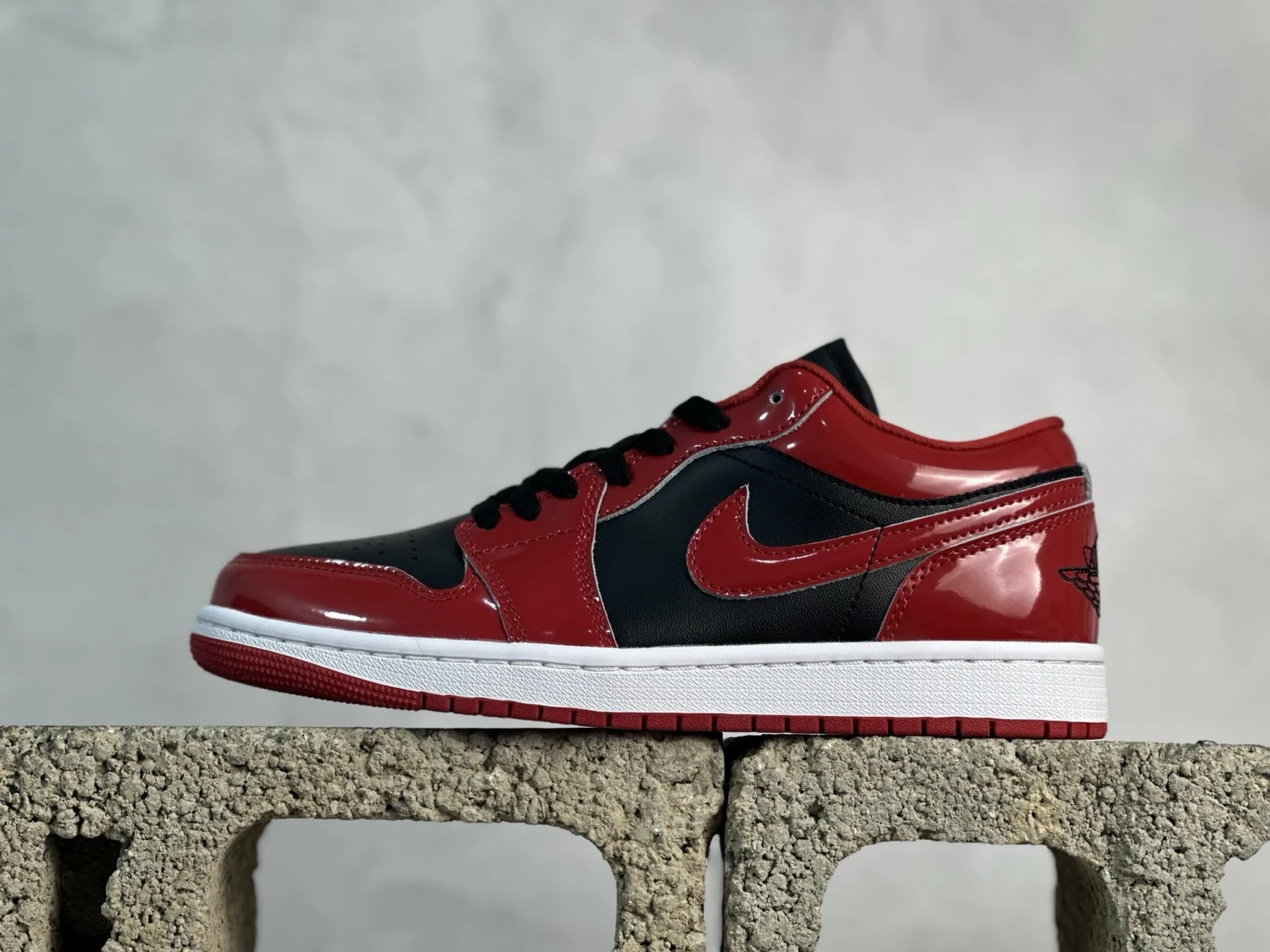 Air Jordan Low – Red & Black Statement Sneakers