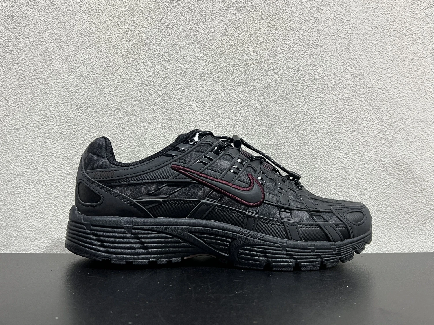 Nike P-6000 Triple Black with Burgundy Swoosh Running Sneakers – Retro Lifestyle Sports Shoes