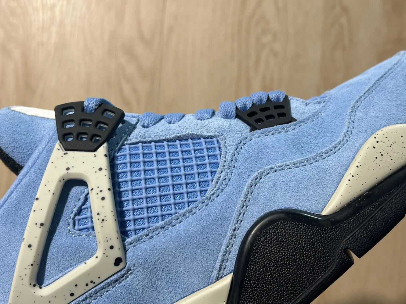 Nike Air Jordan 4 Retro “University Blue Suede” Sneakers