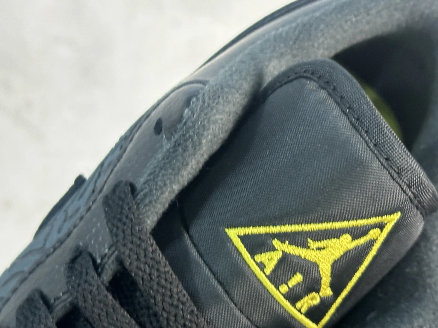 Air Jordan Low – Triple Black with Volt Yellow Accents